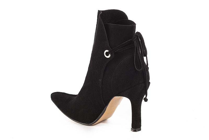 Matt black women's ankle boots with laces at the back. Tapered toe. Very high spool heels. Rear view - Florence KOOIJMAN